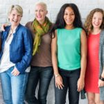 Group of women smiling about Fibroid Awareness Month