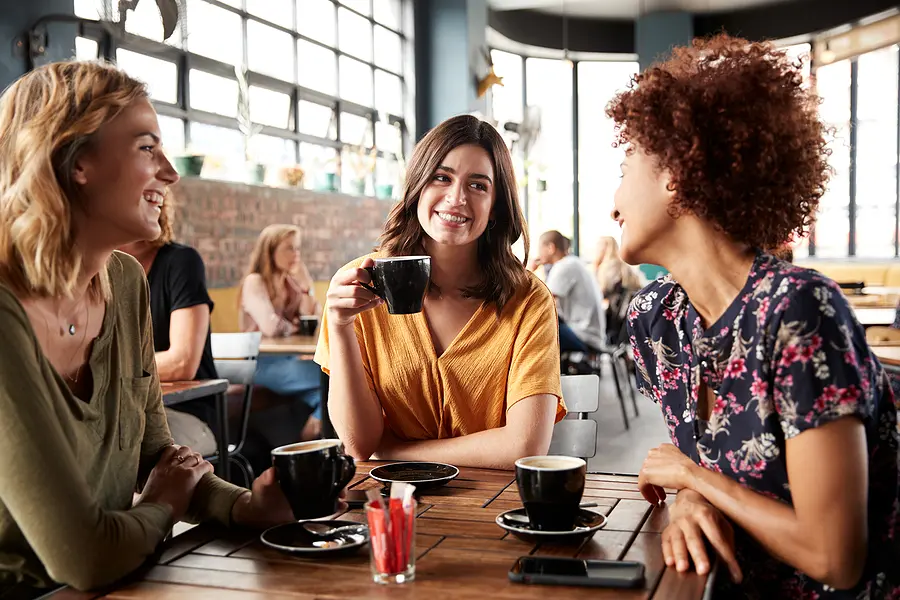 How Common Are Fibroids? 1 3 women at a table discussing uterine fibroids and their health