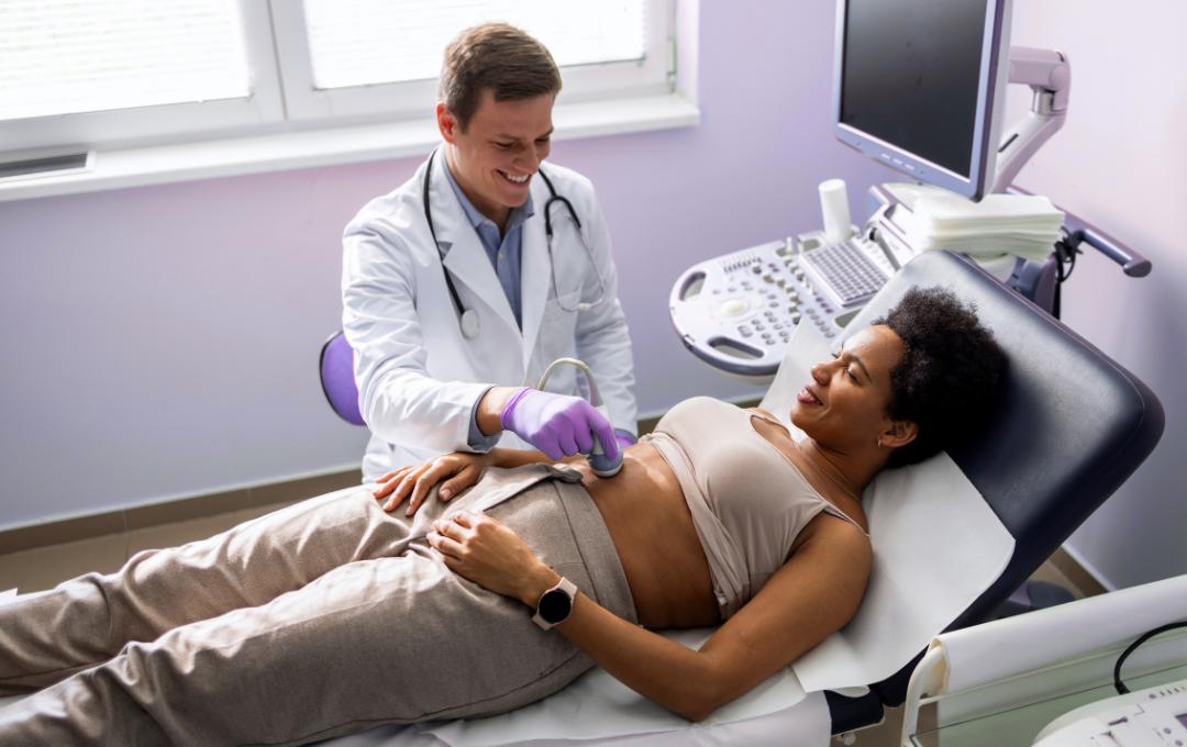 Can Fibroids Burst? 4 Fibroid specialist doing an ultrasound
