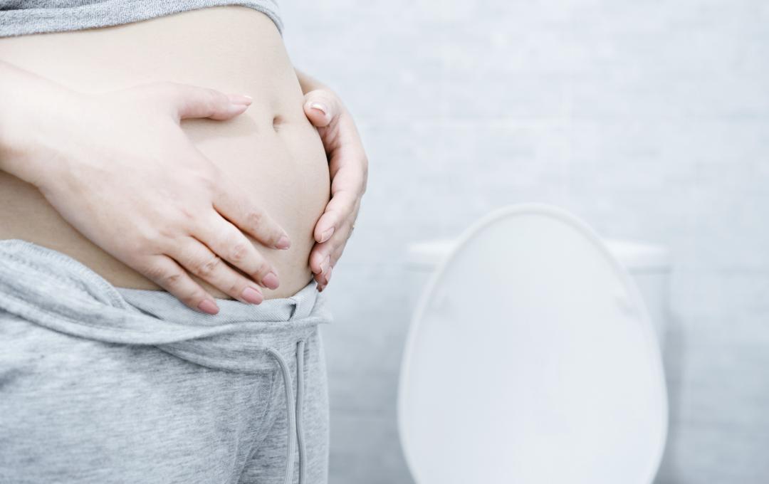 Can Adenomyosis Cause Weight Gain? 2 Woman with protruding belly or adenobelly.