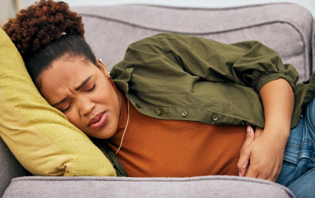 How Progesterone And Fibroids Are Connected 2 Woman experiencing hormone related fibroid symptoms