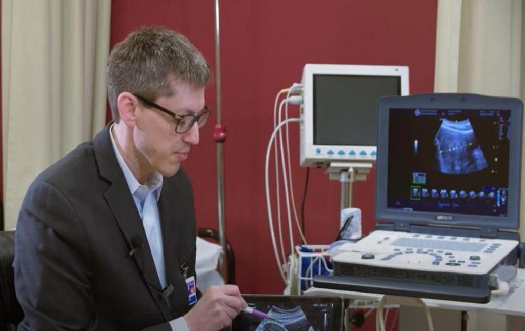 Can Fibroids Affect Ivf Success 3 Tag: Interventional radiologist explaining UFE fertility planning to patient