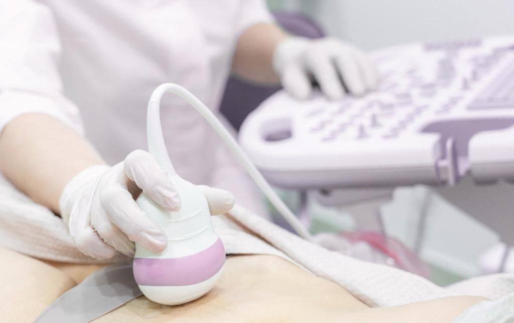 Doctor performing ultrasound to detect fibroids